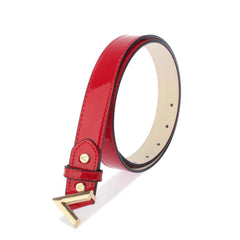 Red belt with gold buckle on a white background